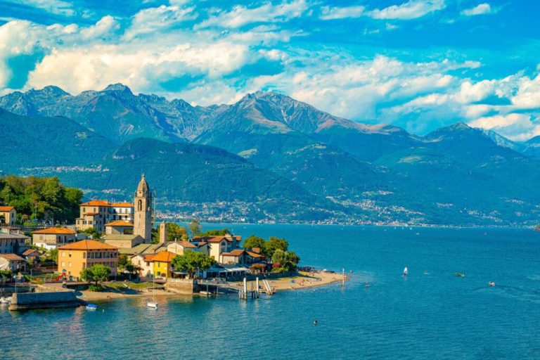 Panorama on the upper lake of Como, with the town of Musso, its houses and the bell tower