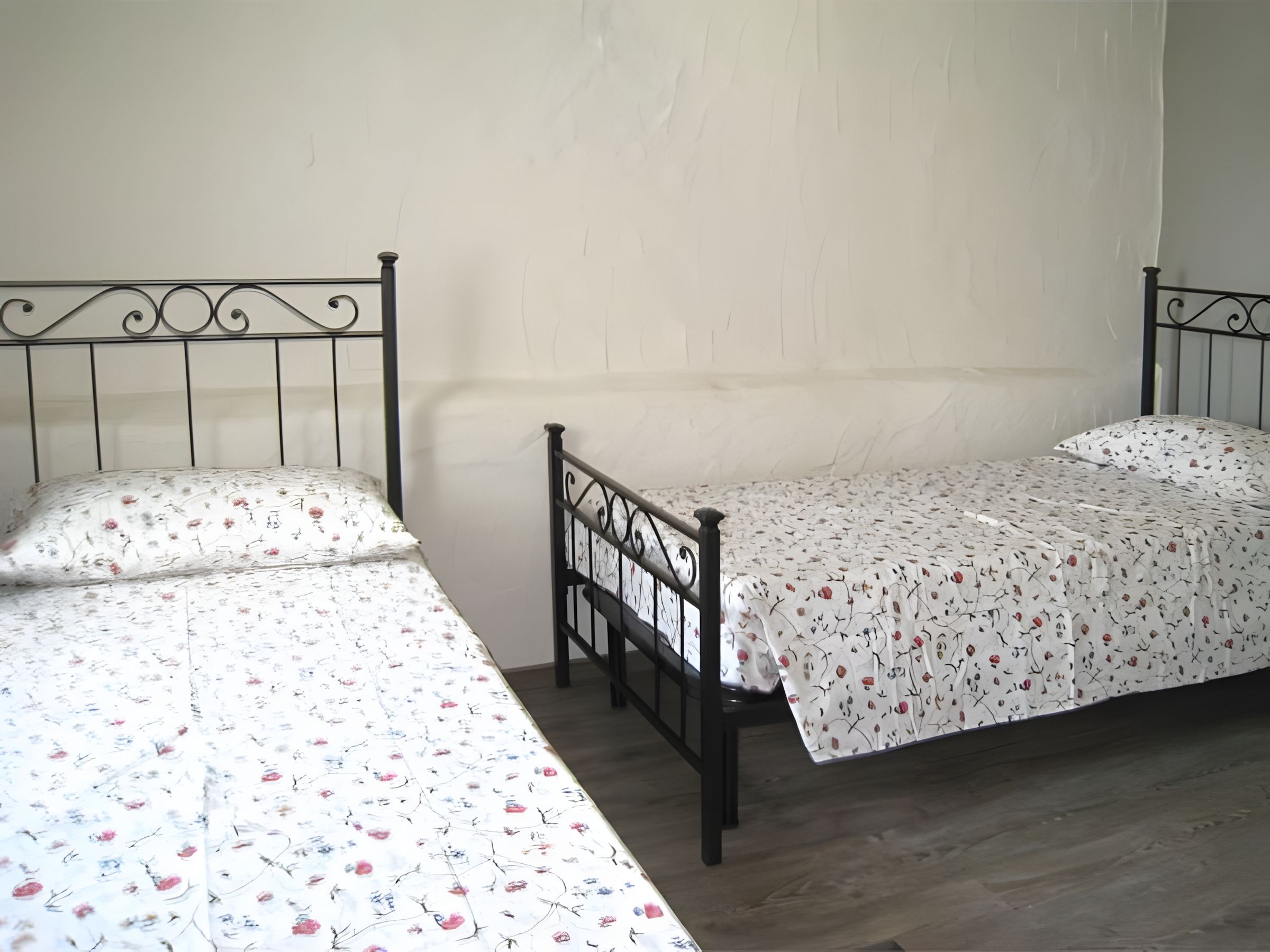 Schlafzimmer einer Ferienunterkunft am Comer See