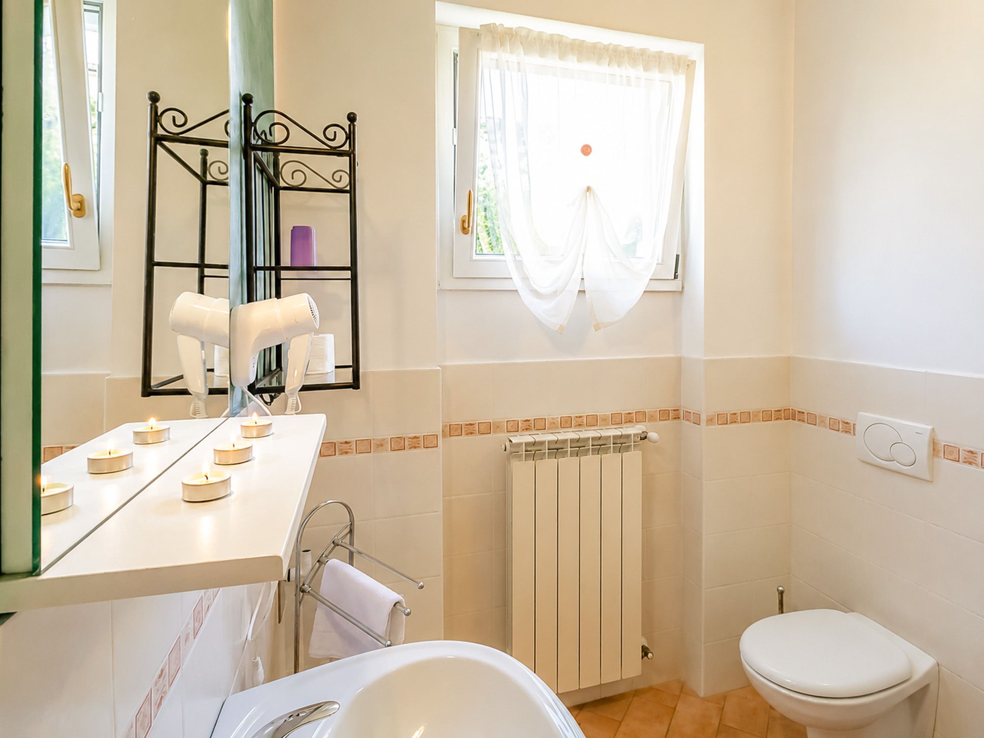 Badezimmer in Ferienwohnung am Comer See